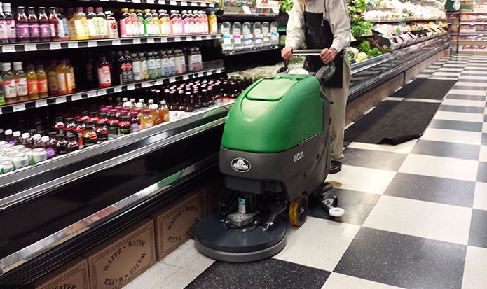 One of our talented employees cleaning our store floors for your safety.